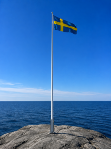 Flaggstångsfäste med klassisk U-balk monterat på berg.